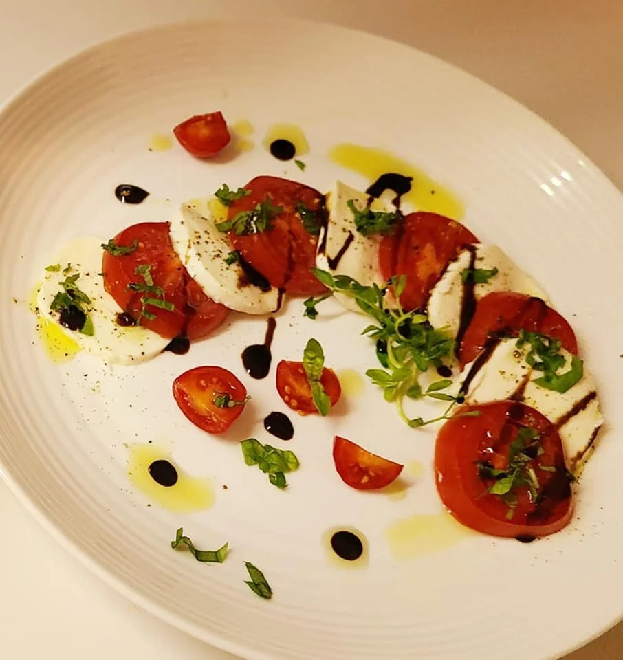 Plated tomato and mozzarella salad — Avant Garde Catering