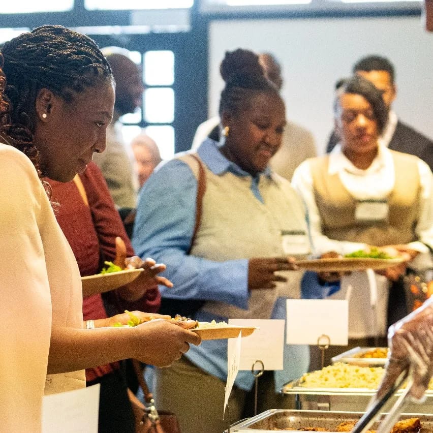 Baccanalle serving guests at an event — Baccanalle
