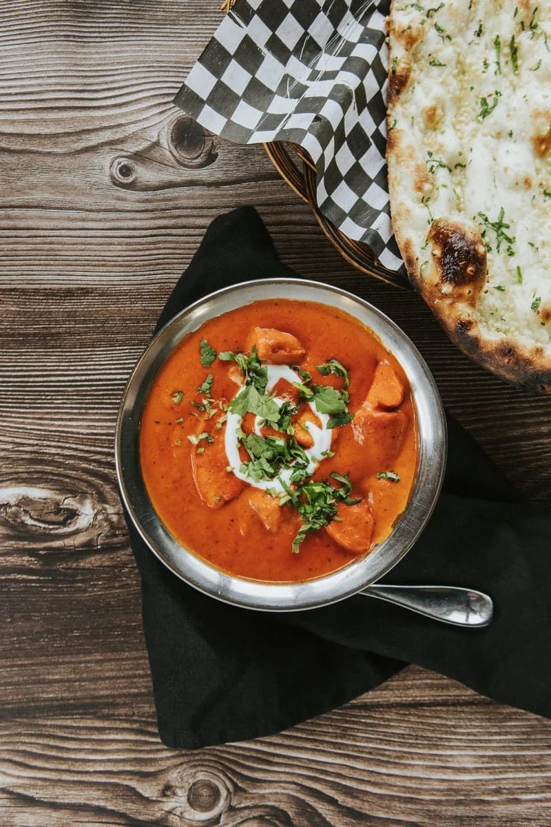 Curry and naan — Host India
