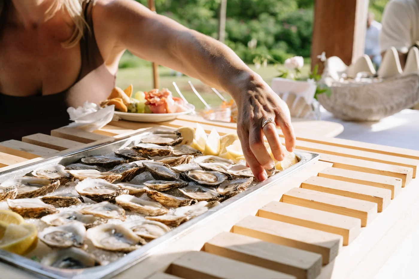 Freshly shucked oysters served at an Off the Hook catered event