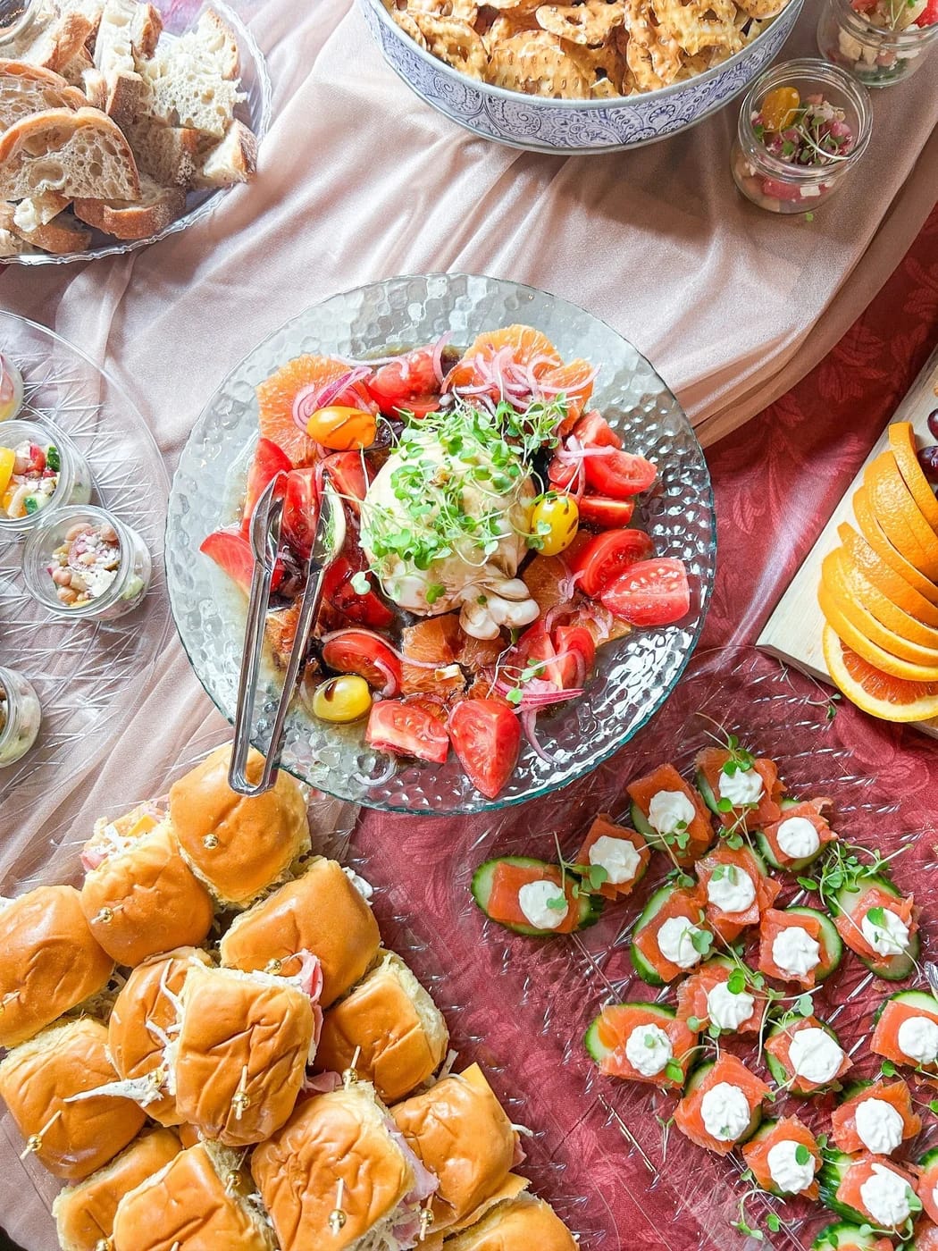 Berry & Brine catering spread with sandwiches, salads and charcuterie